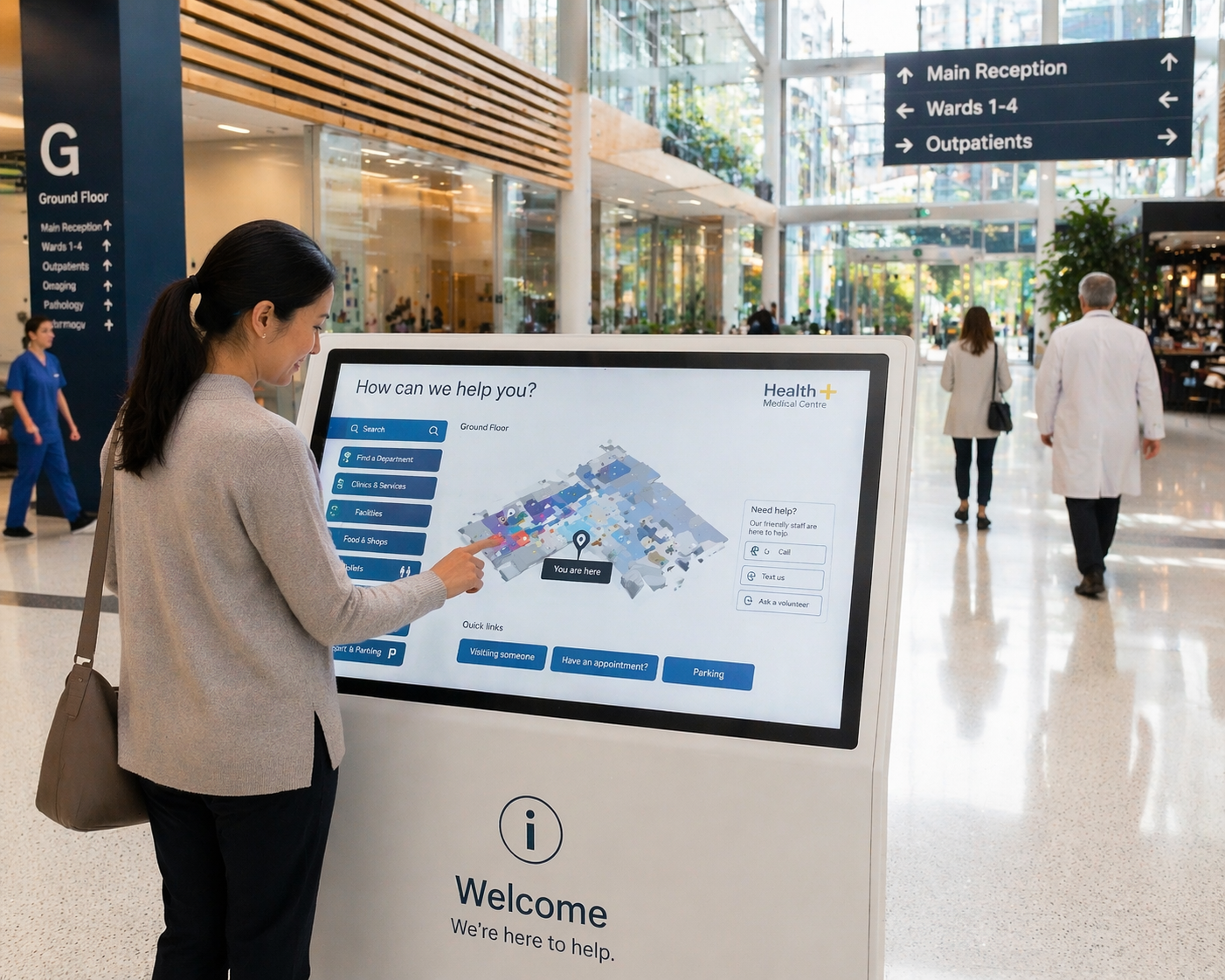 touch-enabled wayfinding kiosk in a hospital lobby or precinct entry
